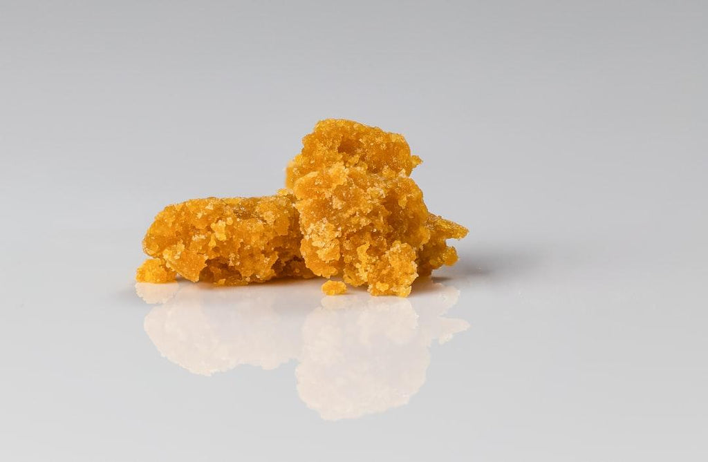  An Amber-colored wax concentrate. 