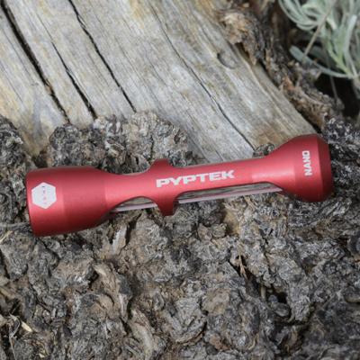 Red Pyptek metal chillum on wood